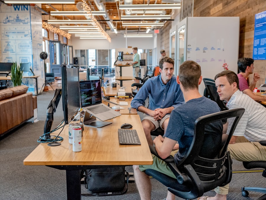 The team talking through a project together at a workspace